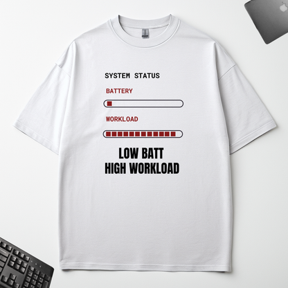 Low Battery High Workload white-oversized t-shirt flat lay on an office desk