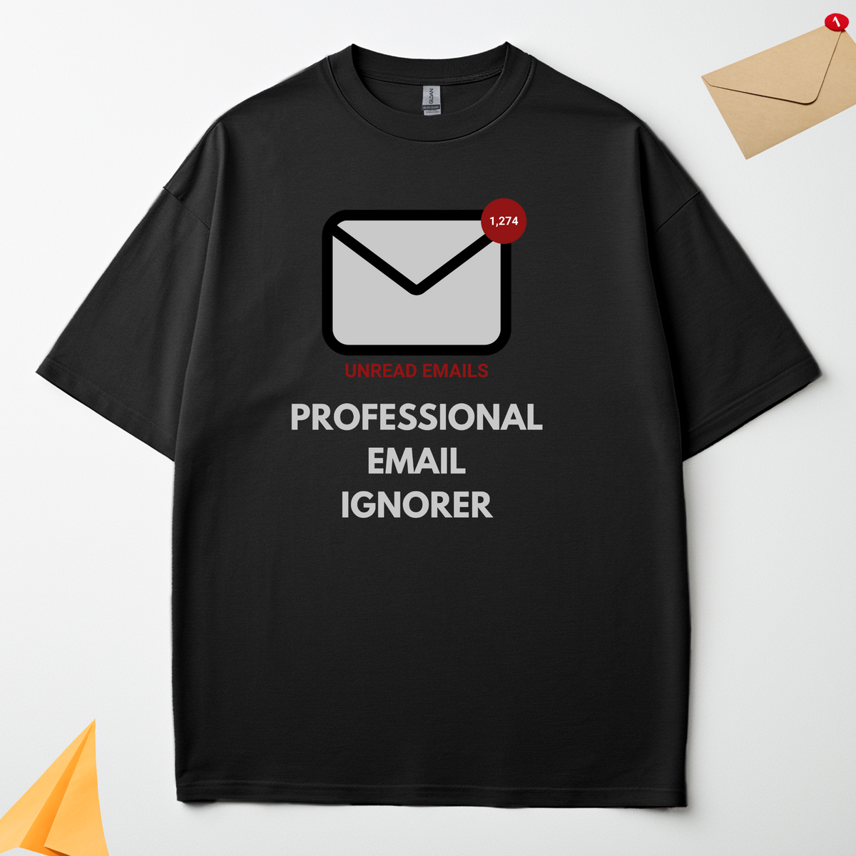 Professional Email Ignorer black oversized t-shirt flat lay showing the graphic design