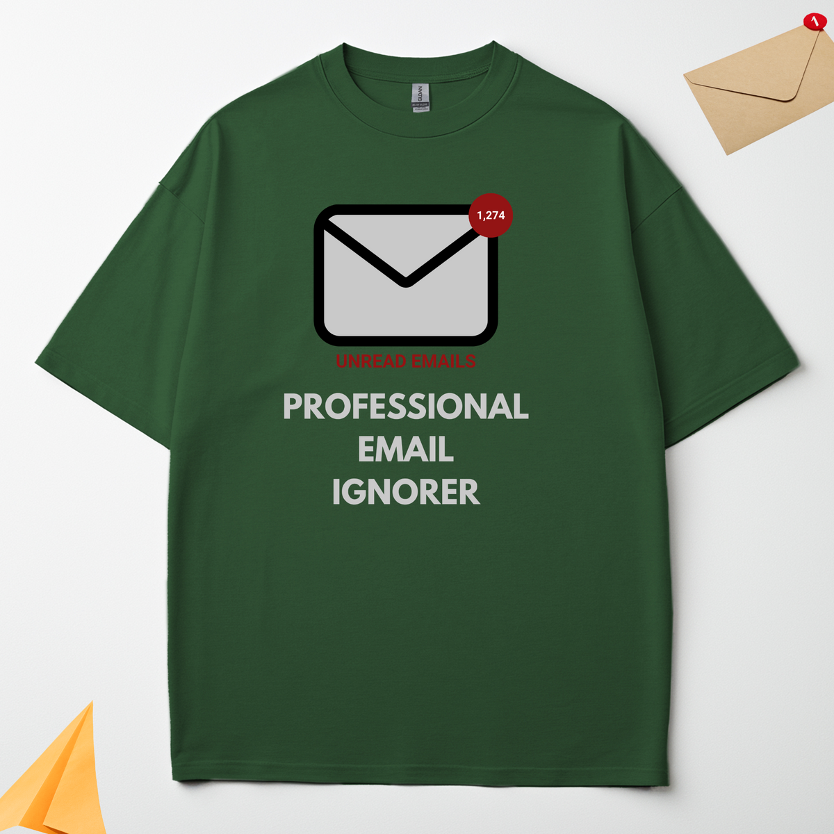 Professional Email Ignorer green oversized t-shirt flat lay showing the graphic design