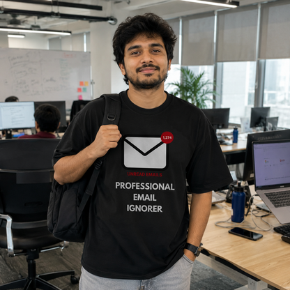 Man wearing a Professional Email Ignorer oversized t-shirt in a modern office